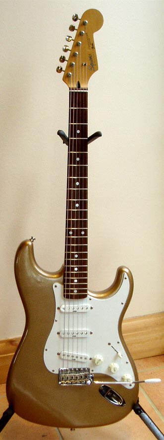 This image has an empty alt attribute; its file name is 0-pg-squierfront.jpg